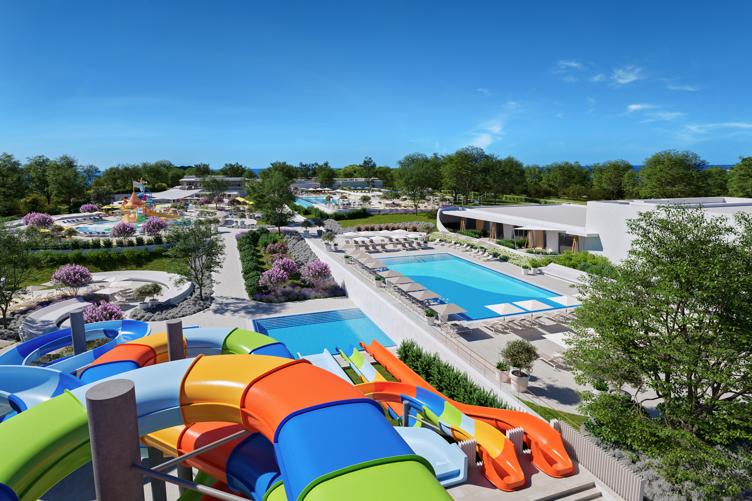 Auf dem Bild sieht man den Wasserpark vom Camping Resort Istra
                                 Premium von Camping Adriatic by Valamar von der Rutsche aus abfotografiert.