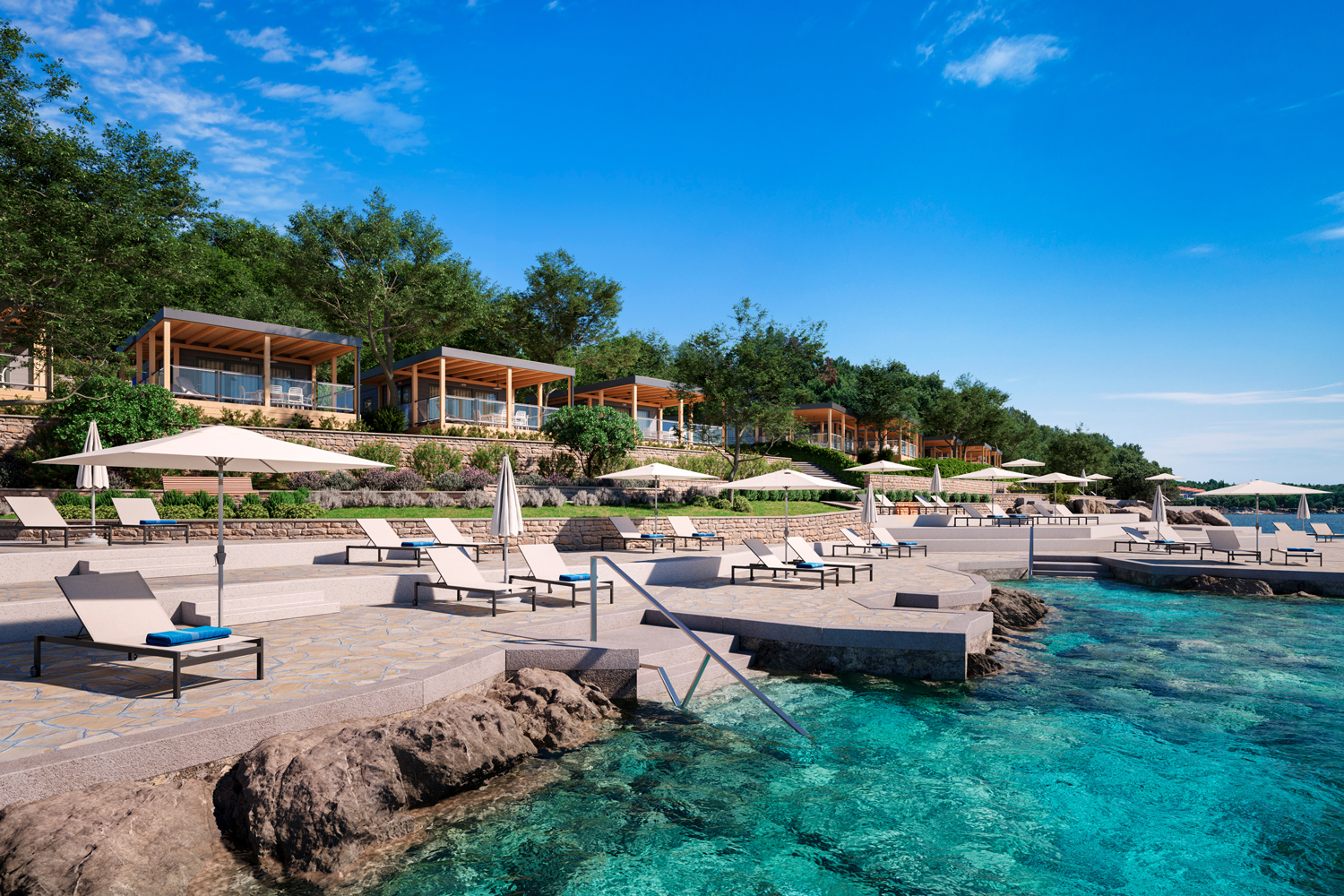 Auf dem Bild sind Premium Camping Suites am Campingplatz Camping Adriatic by Valamar in Istra zu sehen.
                                 Vor den Suites sind Liegestühle mit direktem Zugang zum Meer.